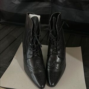 Newport News Black Lace Up Boots Sleek Design